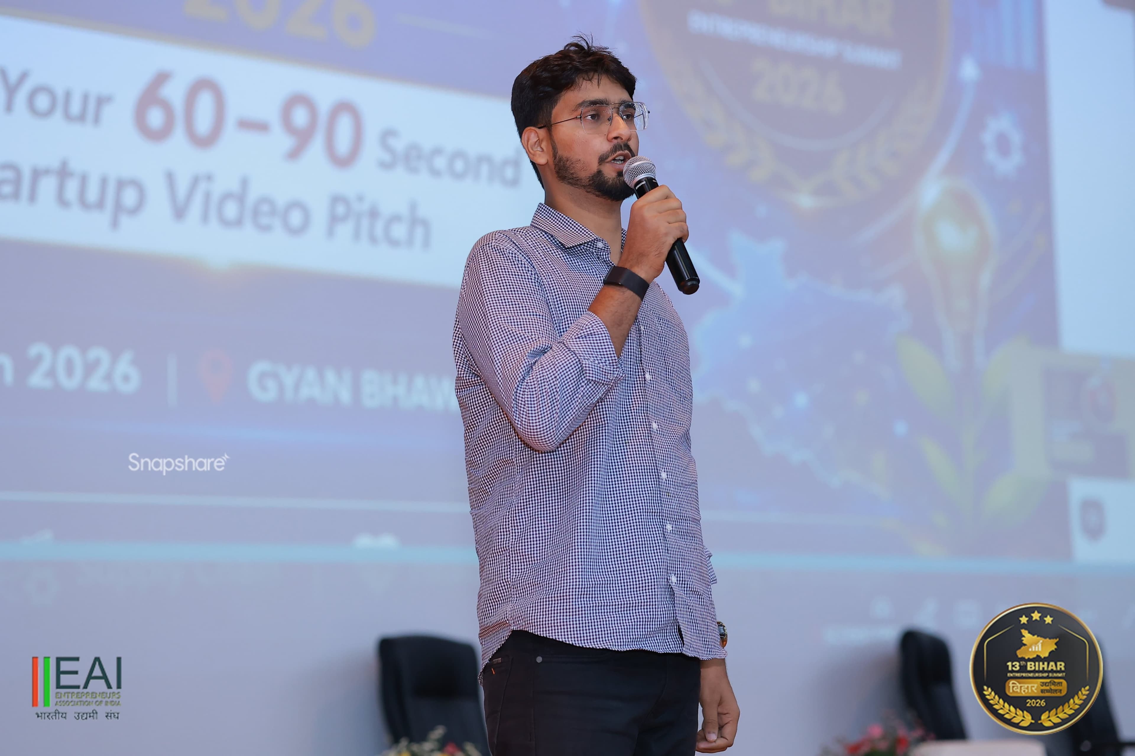 Pitching Justis AI in front of the summit screen